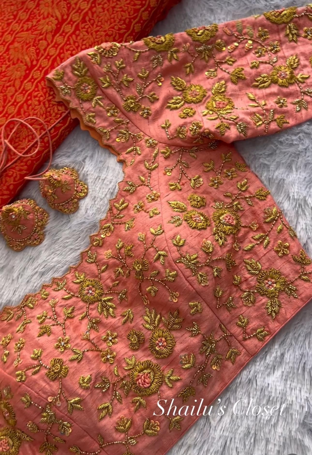 Peach blouse adorned with intricate floral maggam embroidery, ideal for festive and traditional saree styling.