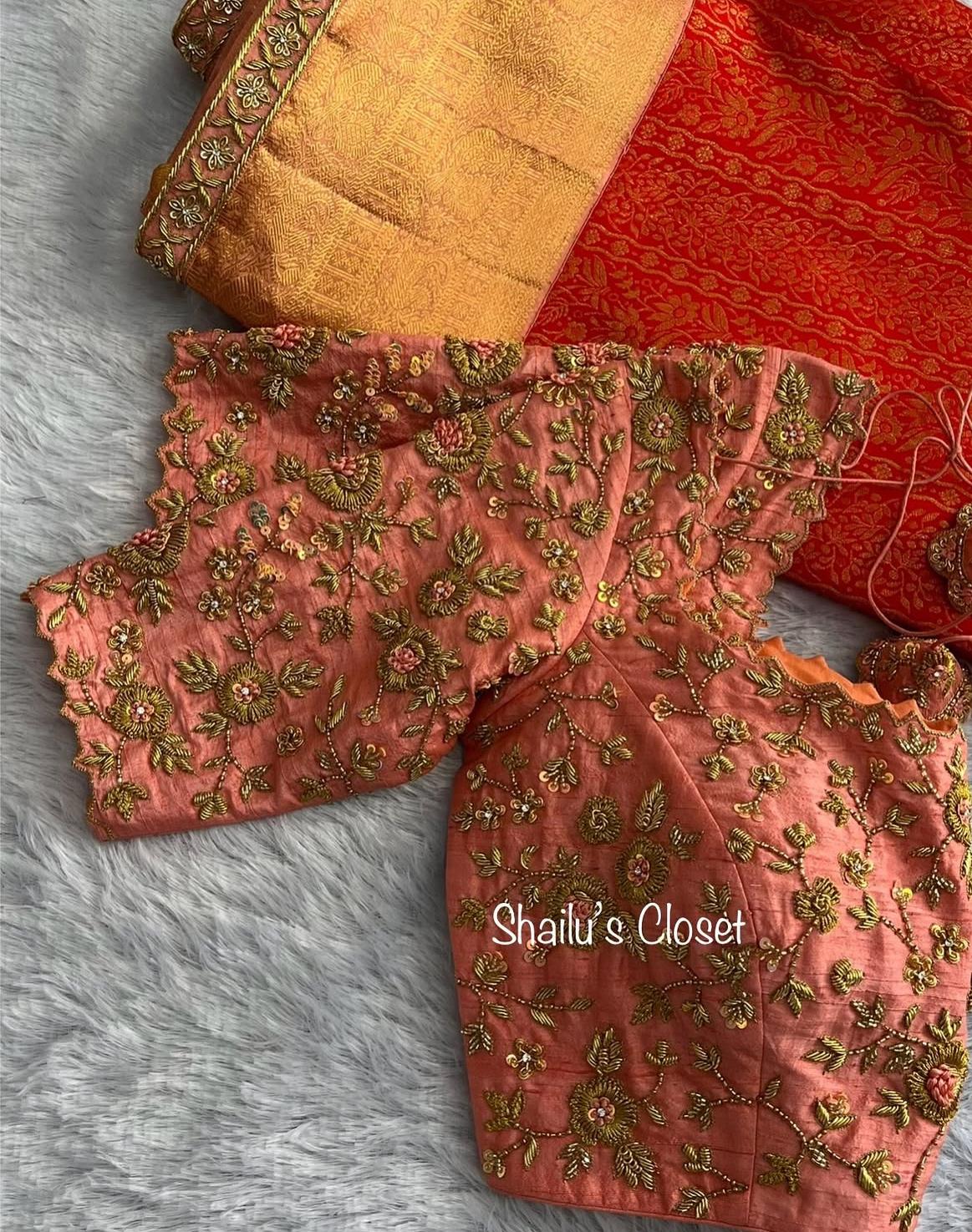 Peach bridal blouse featuring intricate heavy maggam embroidery, perfect for grand traditional weddings.