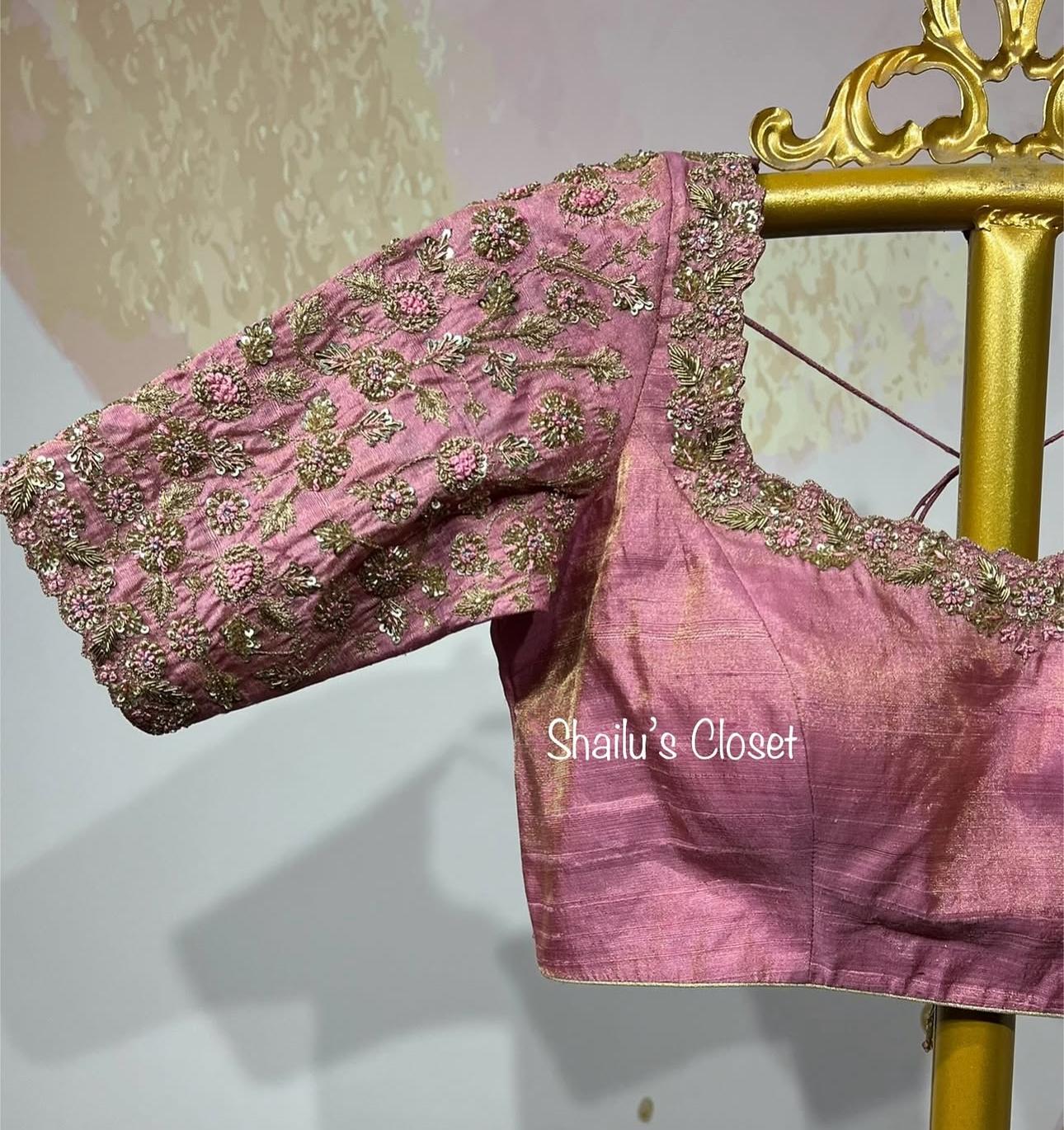 Elegant pink blouse with intricate heavy maggam embroidery on sleeves, ideal for wedding and festive sarees.