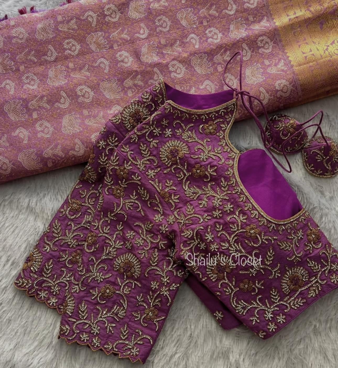 Purple bridal blouse with heavy maggam embroidery and designer sleeve work