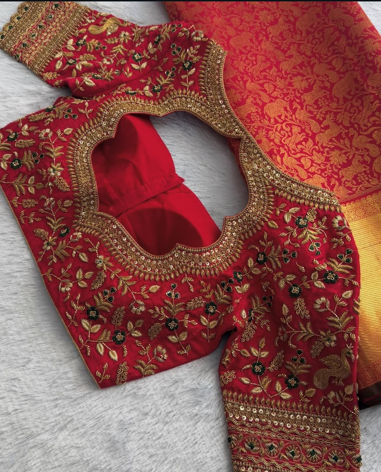 Red bridal back neck blouse with rich maggam embroidery and silk finish