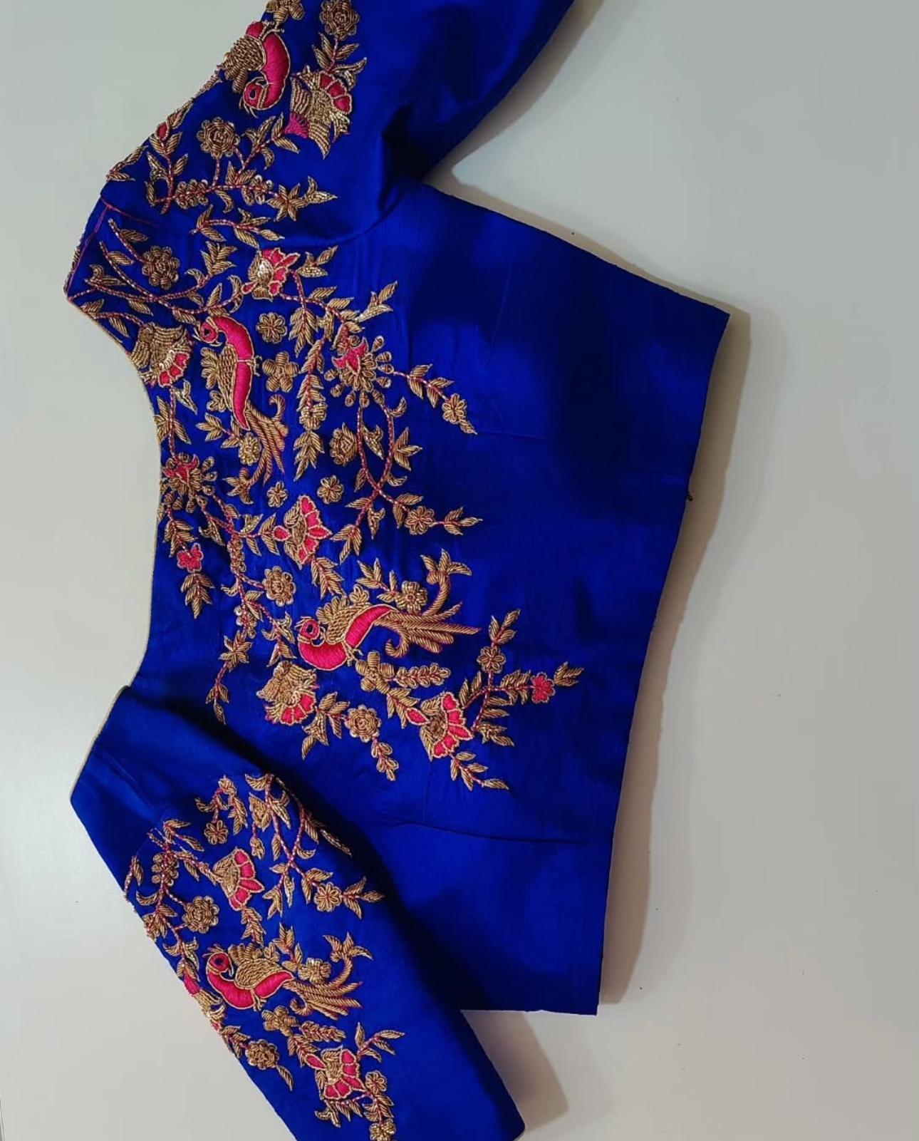 Blue blouse with heavy floral maggam work embroidery