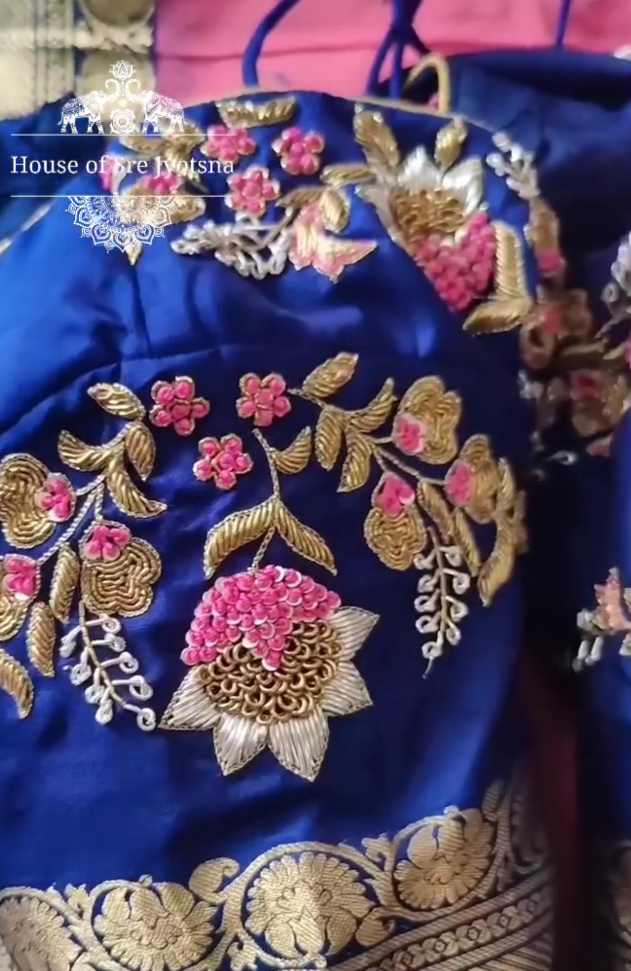 Blue bridal blouse with heavy floral maggam work embroidery
