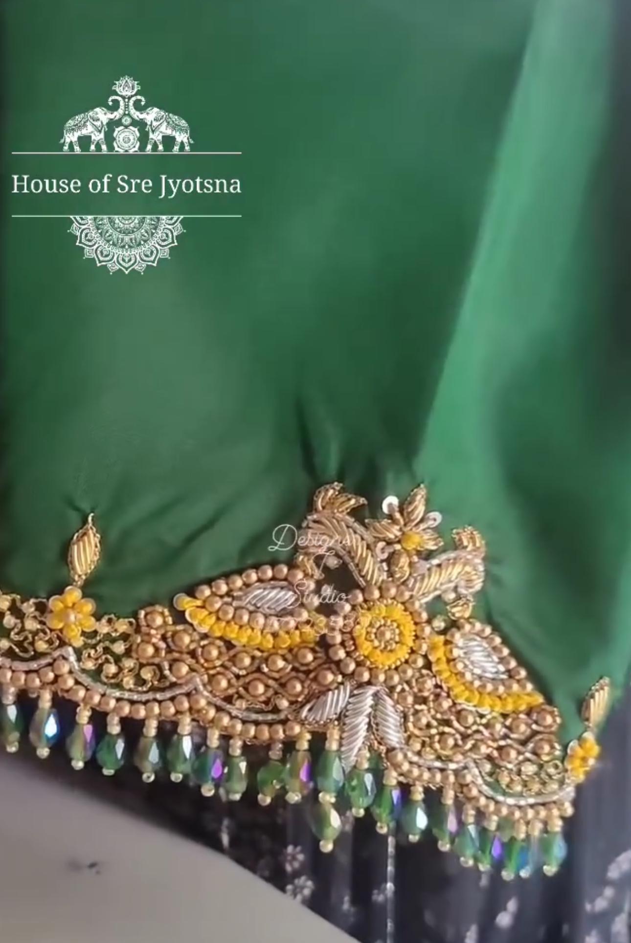 Green blouse border with traditional maggam work