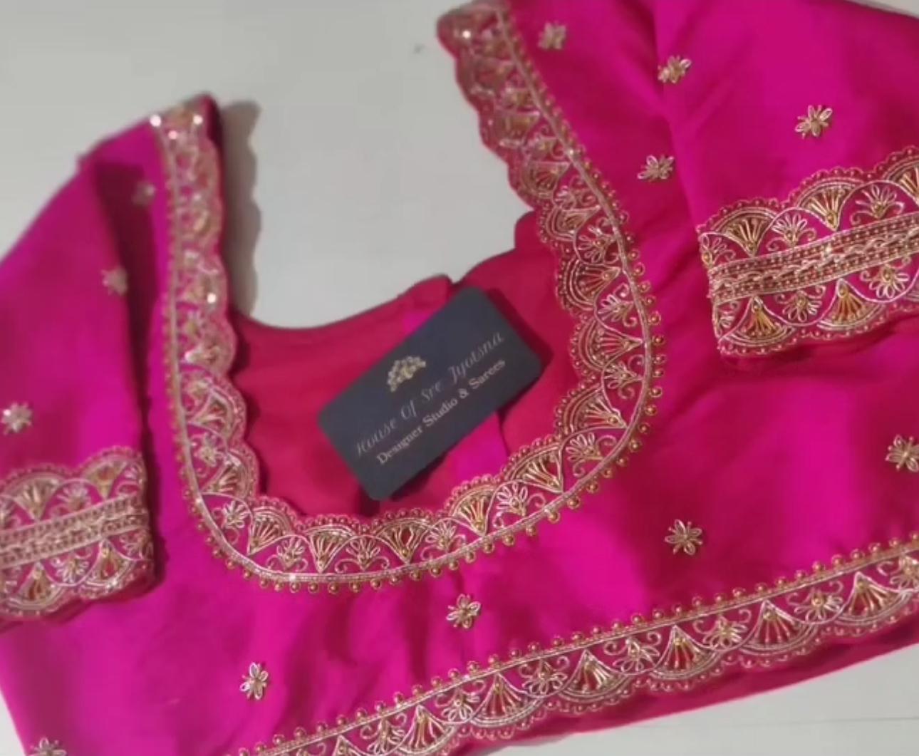 Pink blouse with floral maggam work neck design