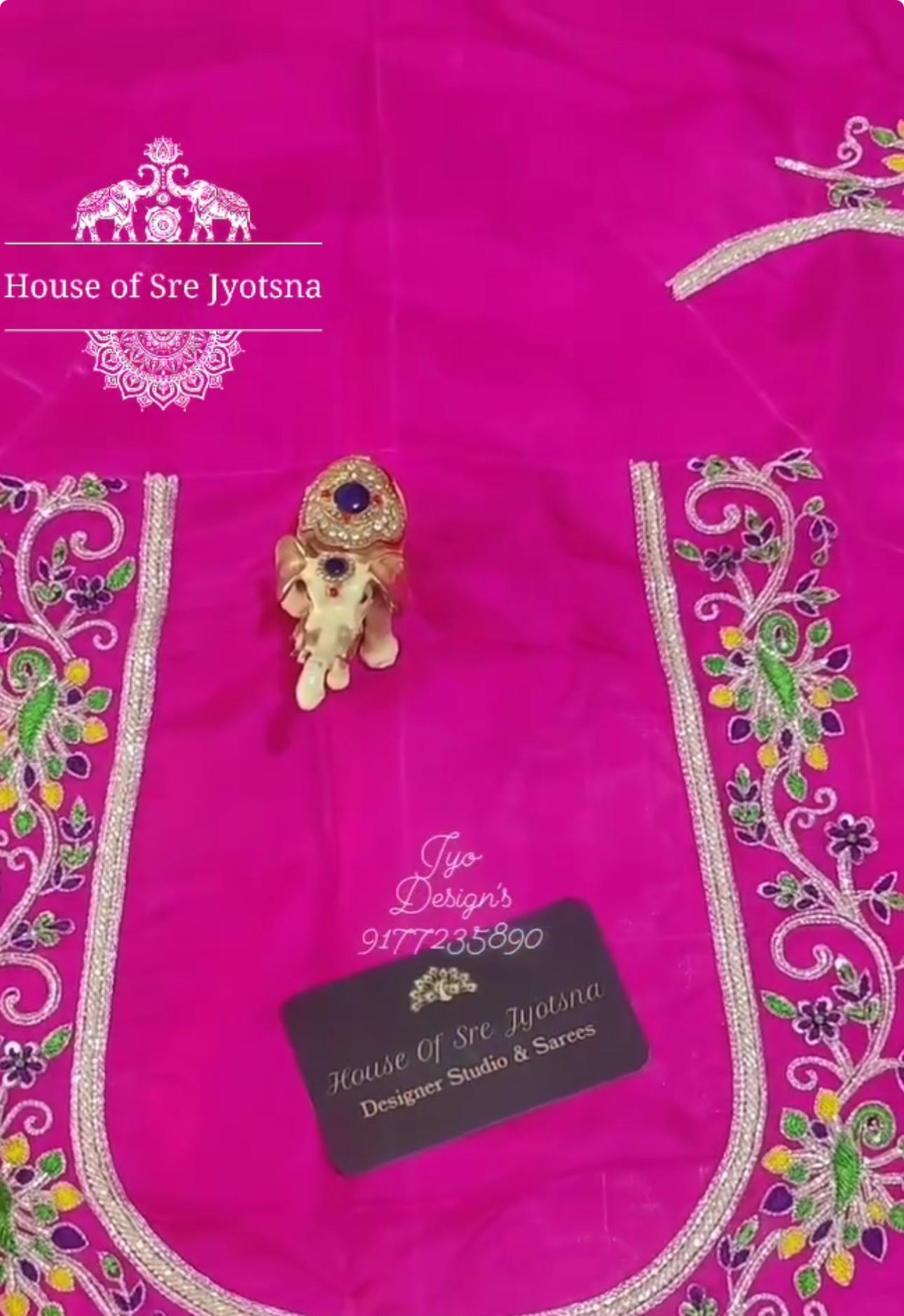 Pink bridal blouse with floral maggam work neck design