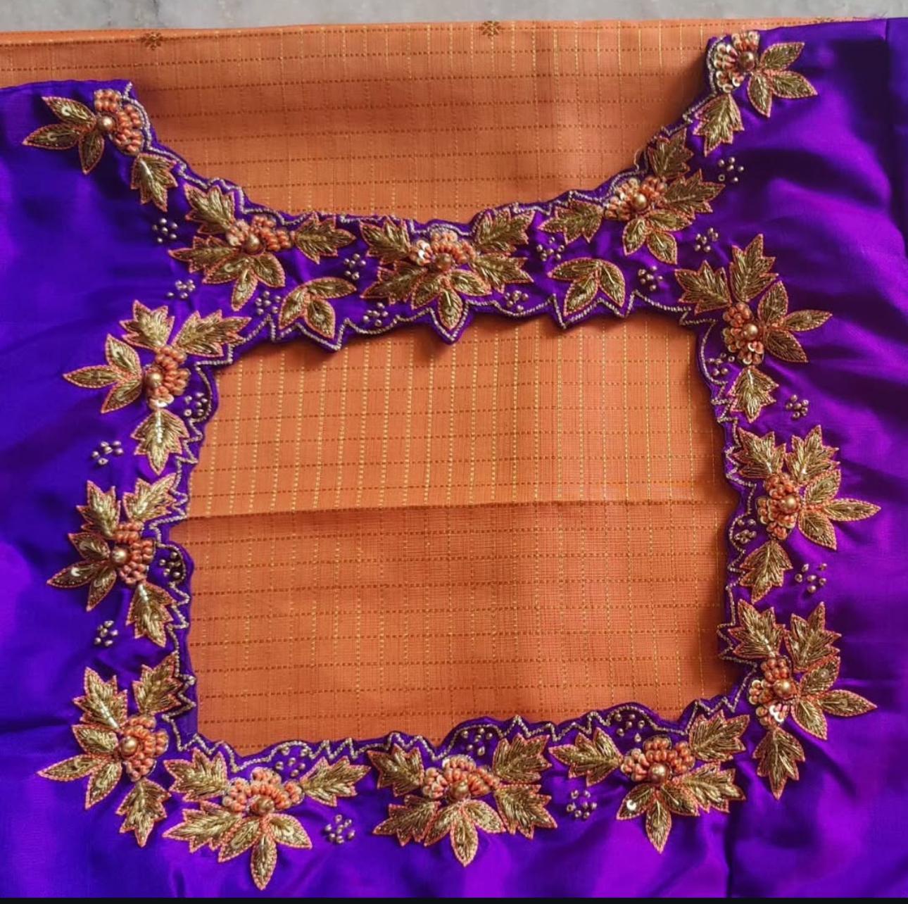 Purple blouse with floral maggam work back design