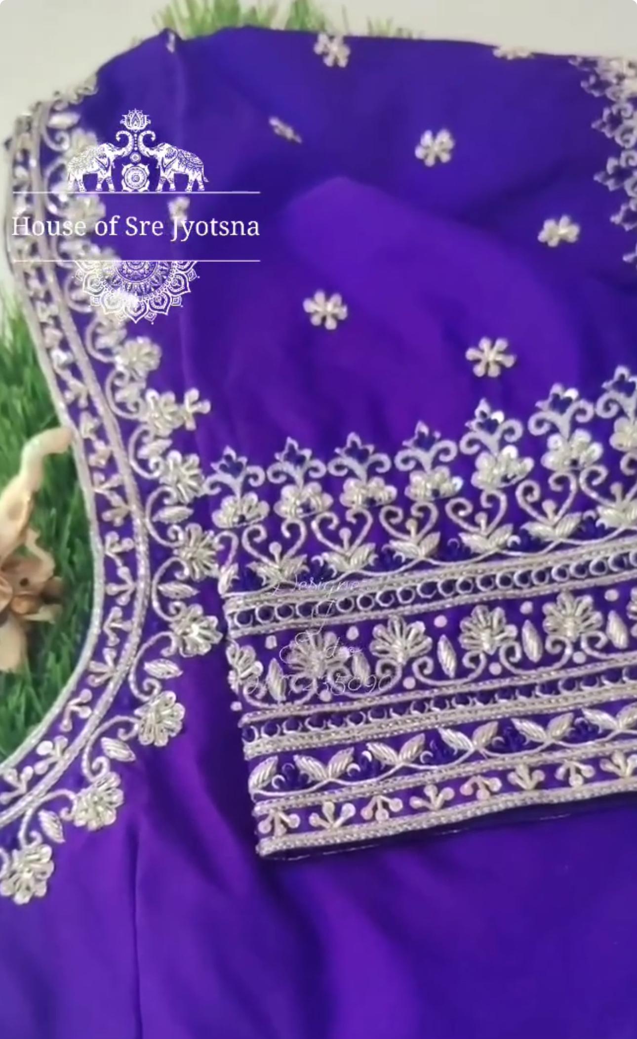 Purple blouse with floral maggam work neck design