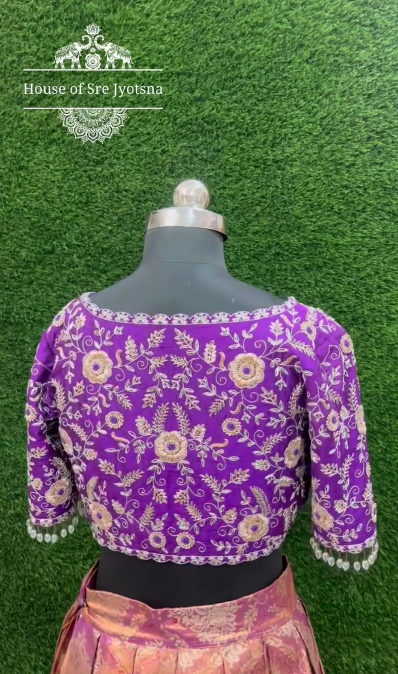Purple bridal blouse with floral maggam work back design