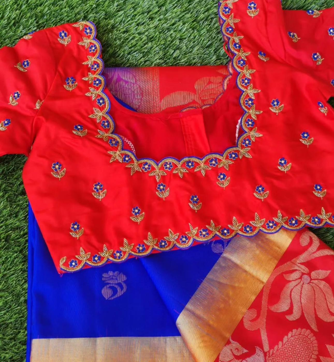 Red blouse with floral maggam work neck design