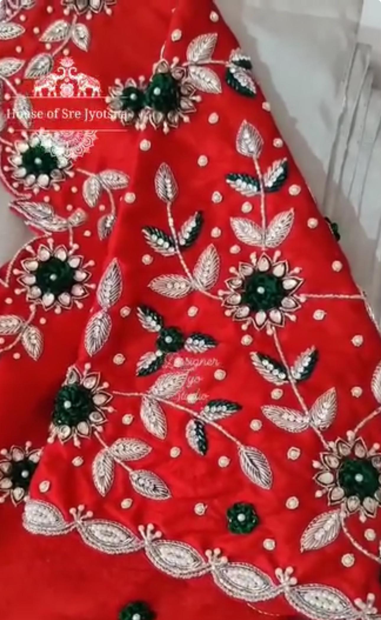 Red blouse with floral maggam work embroidery